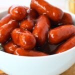 Barbecue glazed little smokies served in a white bowl