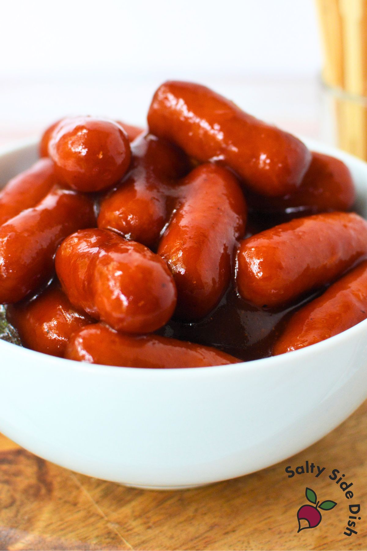 Barbecue glazed little smokies served in a white bowl
