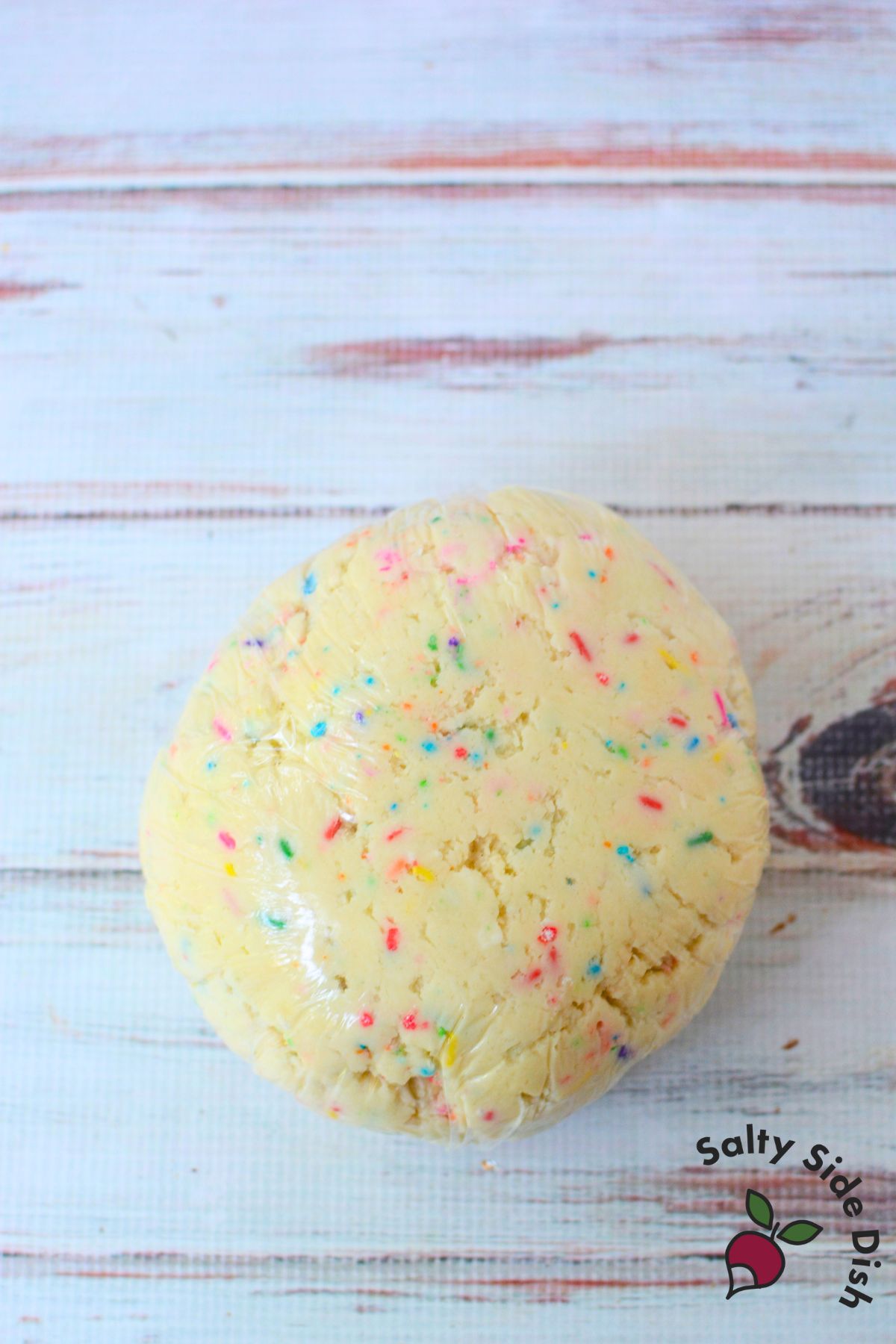 dip wrapped in a plastic wrap into the shape of a ball.