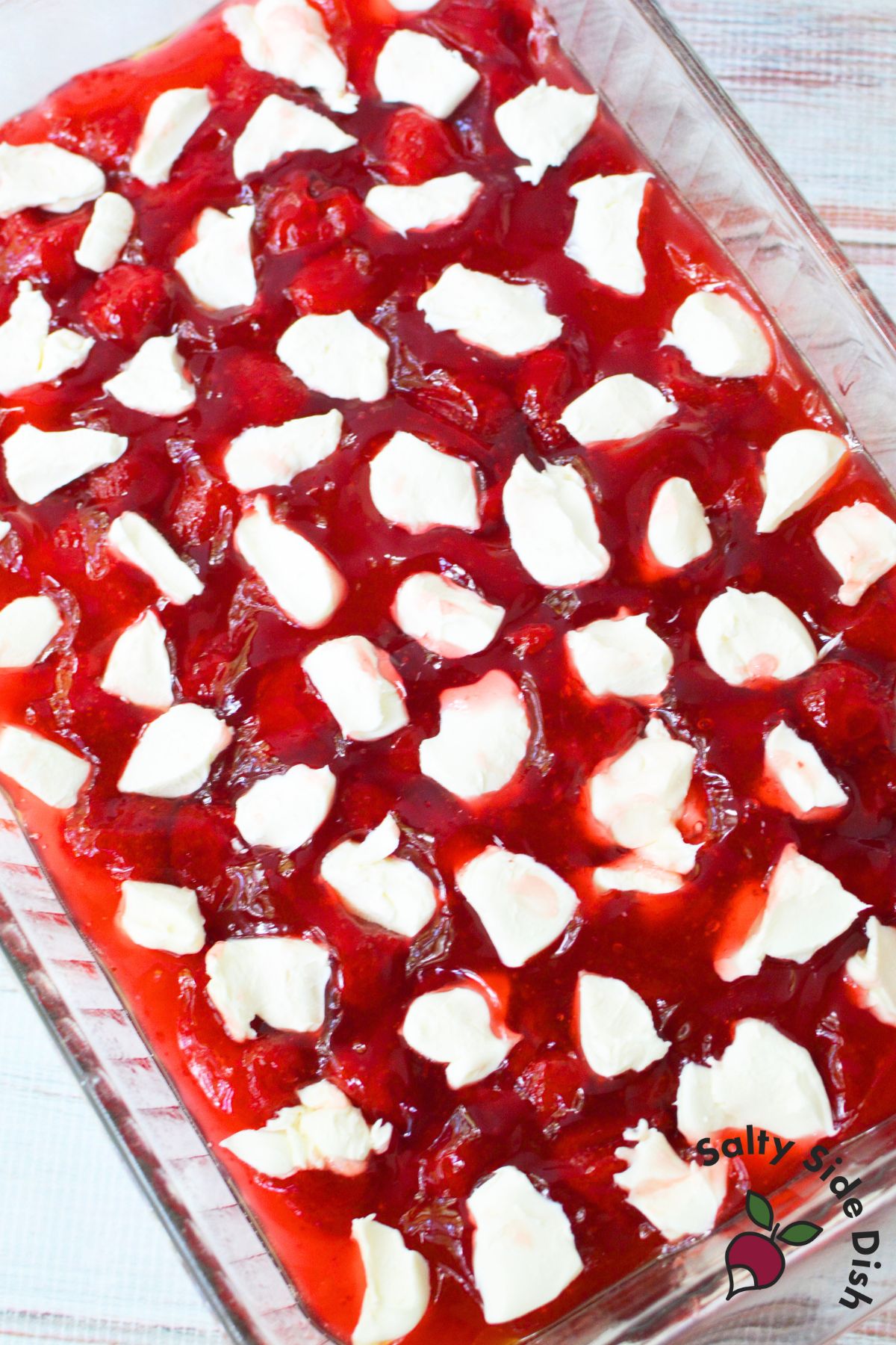 cream cheese pieces on cherry pie.