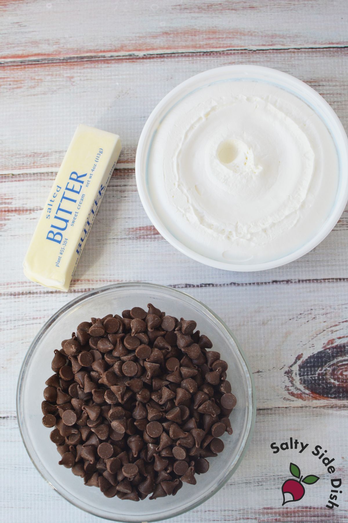 3 ingredient cool whip candy recipe ingredients with butter, chocolate chips, and whipped topping for Christmas candy making