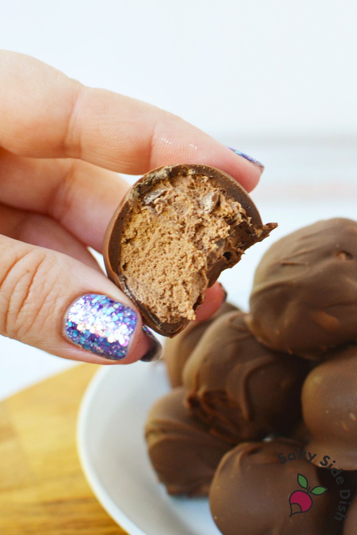 easy Christmas cool whip candy with fluffy nougat center inside homemade chocolate bite