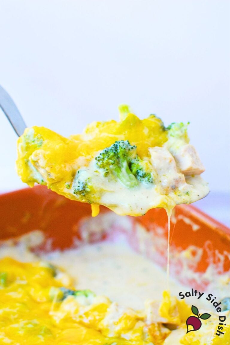 Close up of chicken broccoli casserole with creamy Campbell’s soup sauce, broccoli florets, and chunks of chicken