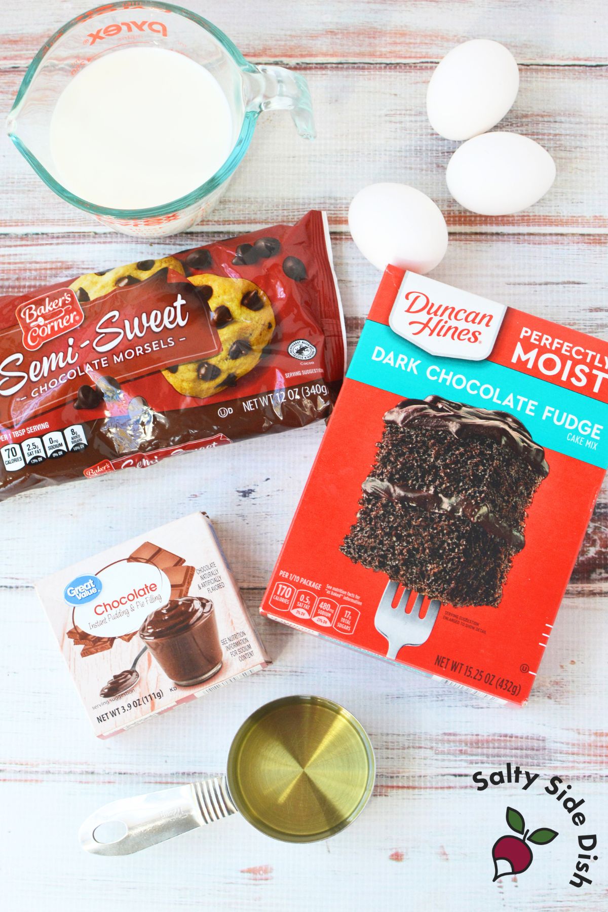 Ingredients for crockpot chocolate lava cake including cake mix, pudding, and chocolate chips