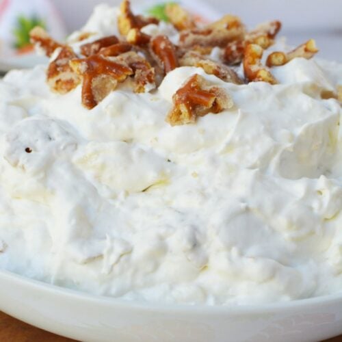 Close up of pineapple pretzel fluff salad with crunchy pretzels folded into creamy pineapple filling