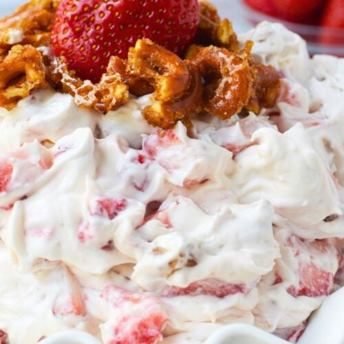 Easy holiday side dish dessert salad with whipped topping, pretzels, and strawberries