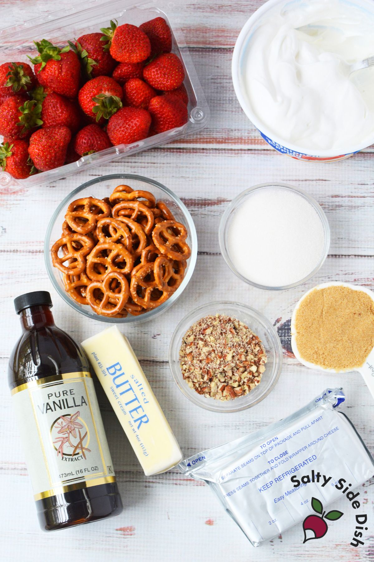 Close up of strawberry pretzel salad ingredients inspired fluff dessert with crunchy baked pretzels