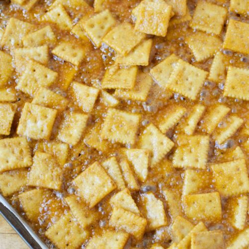 mini saltine crackers baked in caramelized brown sugar mixture for sweet and salty snack recipe