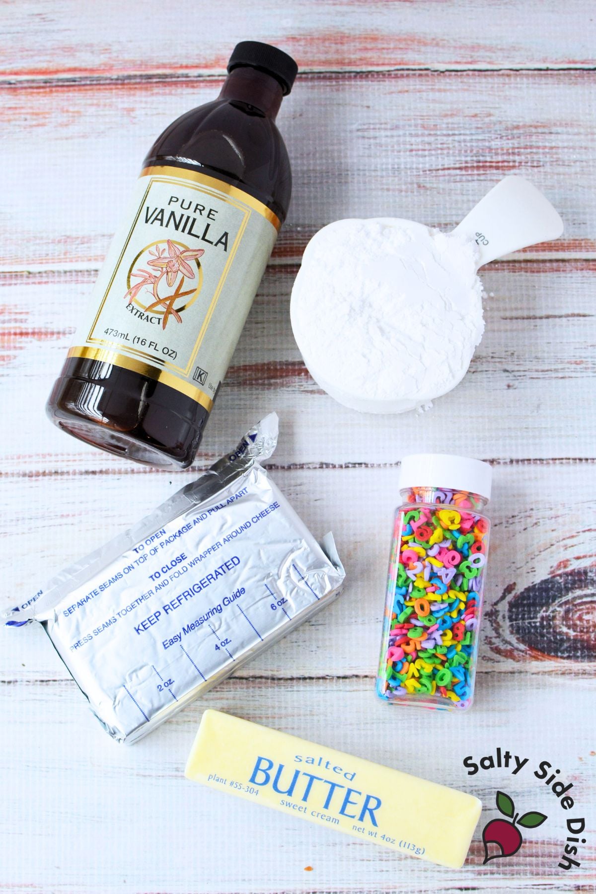 Ingredients for 6-7 cheeseball recipe including cream cheese, butter, powdered sugar, vanilla, and number sprinkles.