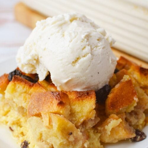 slice of Ruths Chris style bread pudding served warm with vanilla ice cream