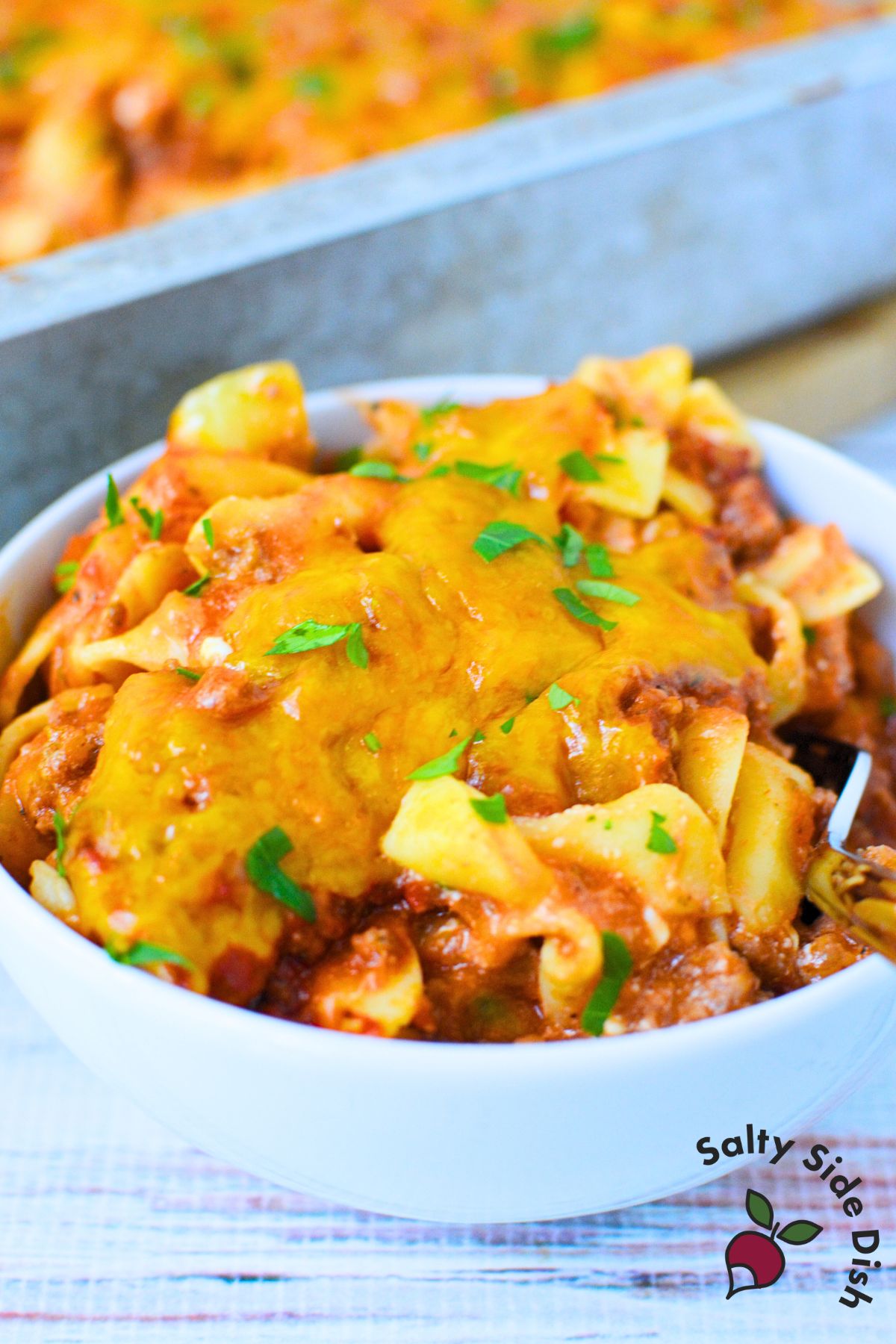cheesy tomato beef noodle casserole fresh out of the oven