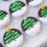 chocolate covered christmas oreos using white chocolate and green frosting christmas tree decoration recipe in progress
