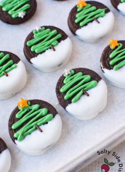 chocolate covered christmas oreos using white chocolate and green frosting christmas tree decoration recipe in progress