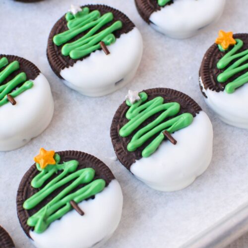 chocolate covered christmas oreos using white chocolate and green frosting christmas tree decoration recipe in progress