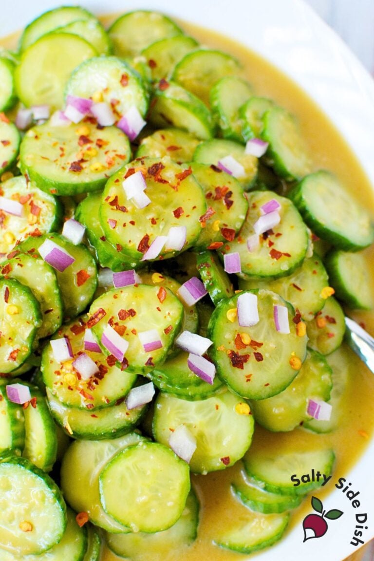 Balsamic cucumber salad with sliced cucumbers in a honey balsamic dressing topped with red onion and crushed red pepper flakes