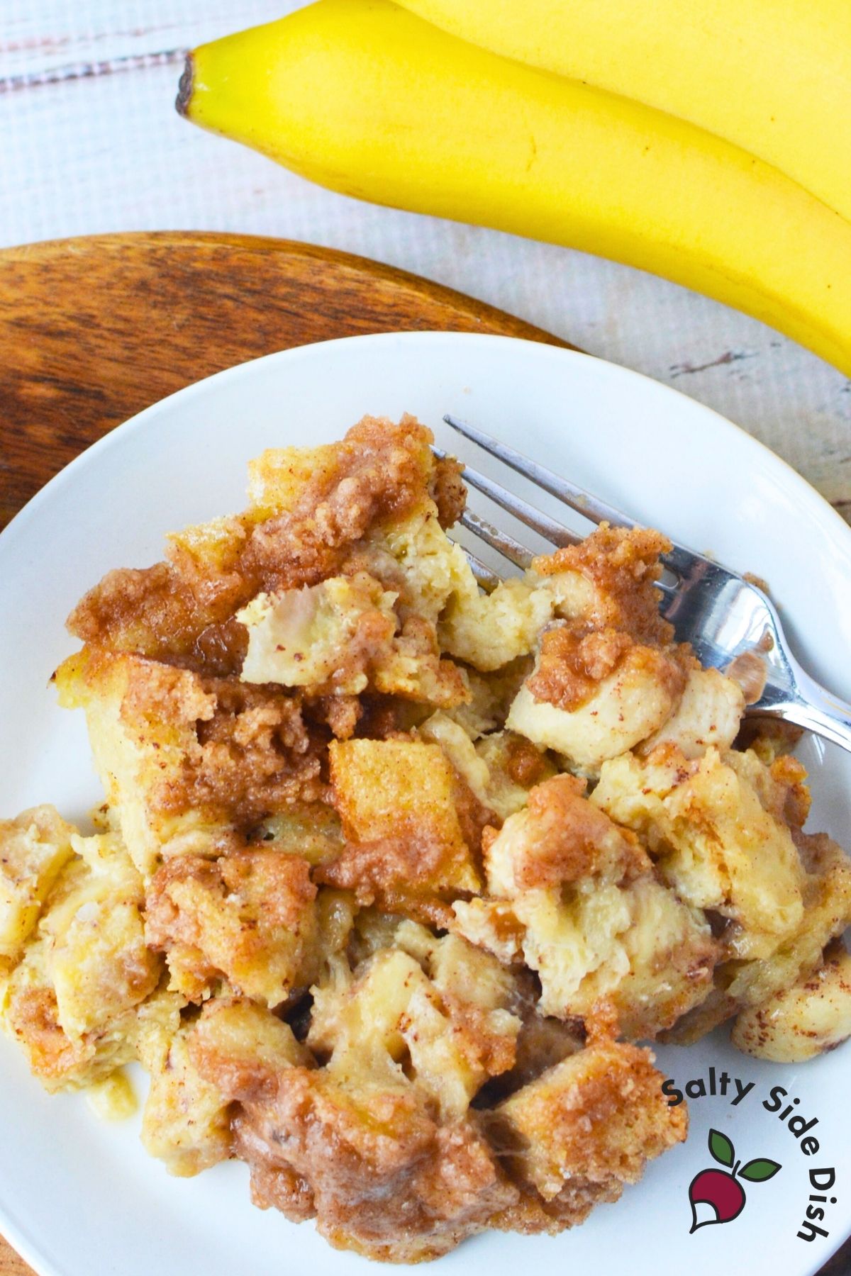 Banana French toast bake with brown sugar topping baked until soft and custardy