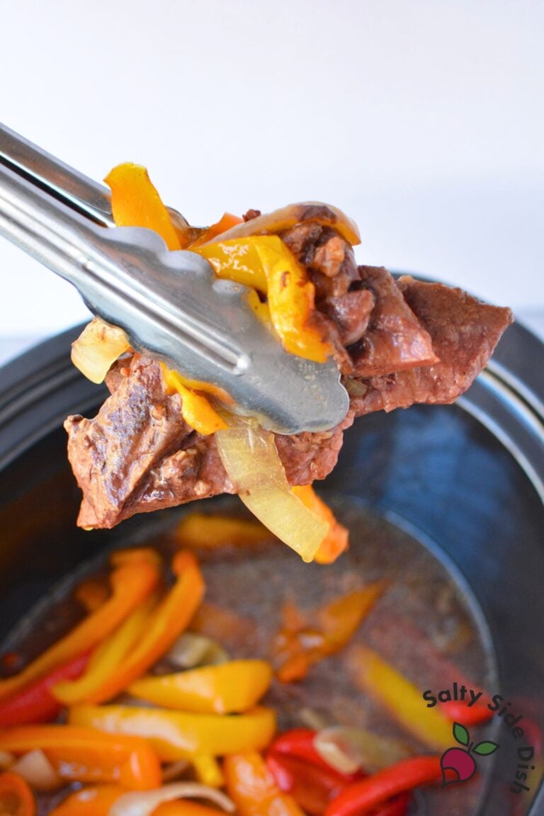 Tender sirloin steak and bell peppers cooked in the slow cooker with soy sauce and beef broth