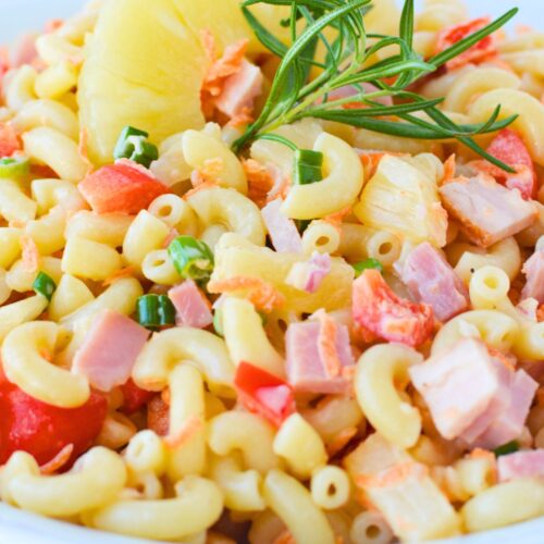 Close up of Hawaiian pasta salad with ham pineapple and elbow pasta tossed in creamy mayonnaise dressing