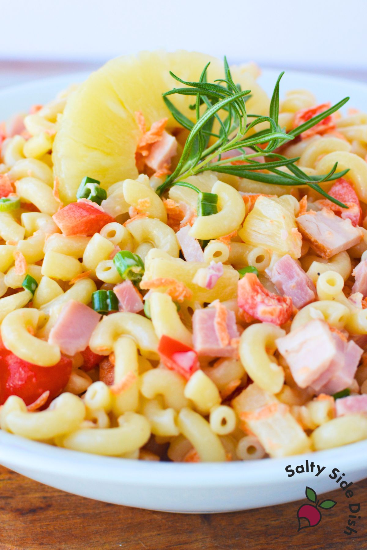 Close up of Hawaiian pasta salad with ham pineapple and elbow pasta tossed in creamy mayonnaise dressing