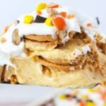 Slice of peanut butter icebox cake showing soft peanut butter cookie layers and creamy pudding filling