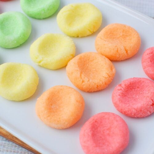 Jello candy melts lined up on a tray before serving