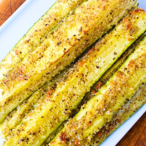 Zucchini spears roasted in butter and parmesan seasoning with lightly browned edges