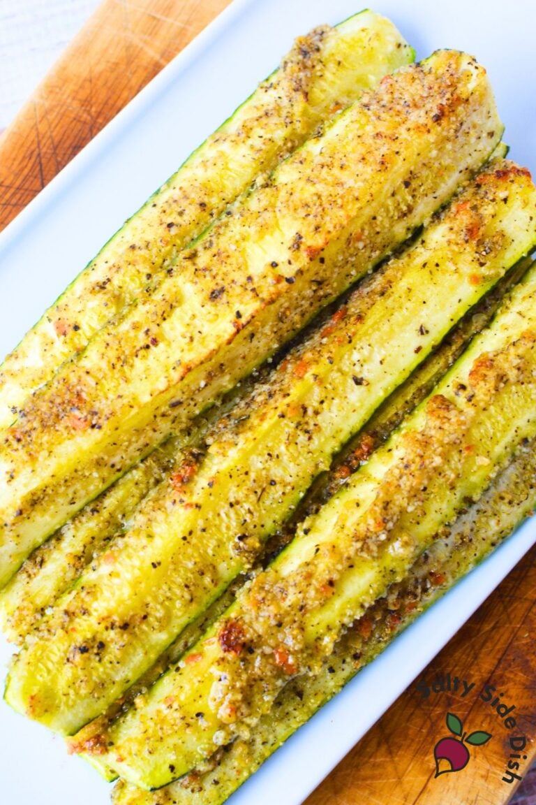 Zucchini spears roasted in butter and parmesan seasoning with lightly browned edges
