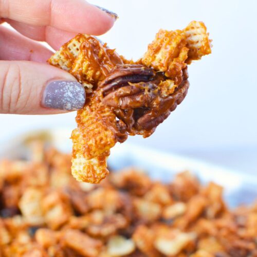 Close-up of finished caramel pecan clusters with crunchy cereal and toasted pecans