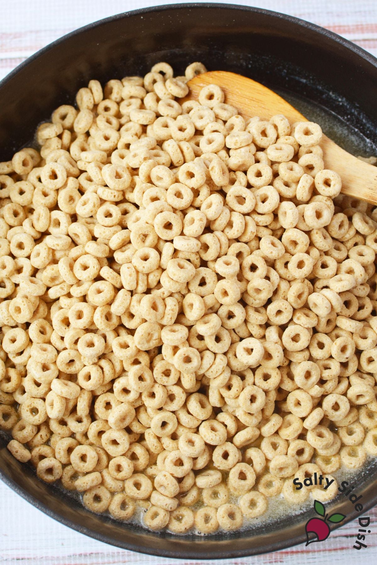 skillet full of pan fried cinnamon sugar Cheerios toasted golden brown