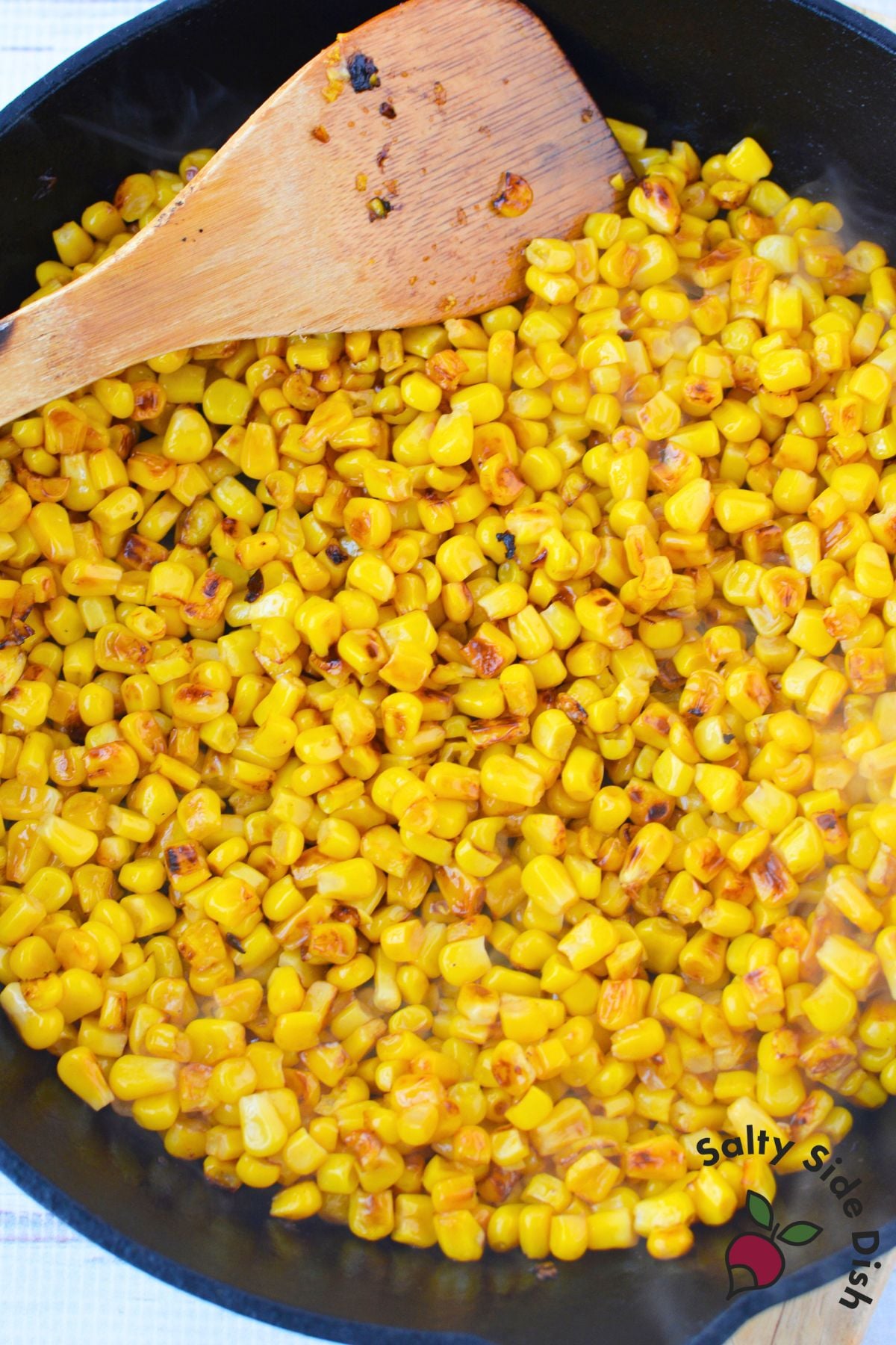 charred corn in skillet.
