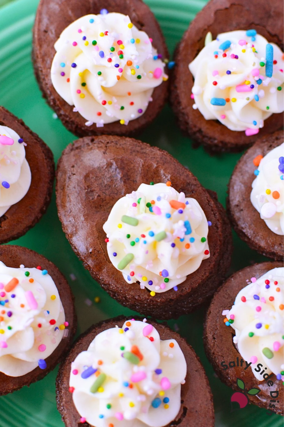 Deviled brownies topped with cream cheese filling and colorful sprinkles for Easter