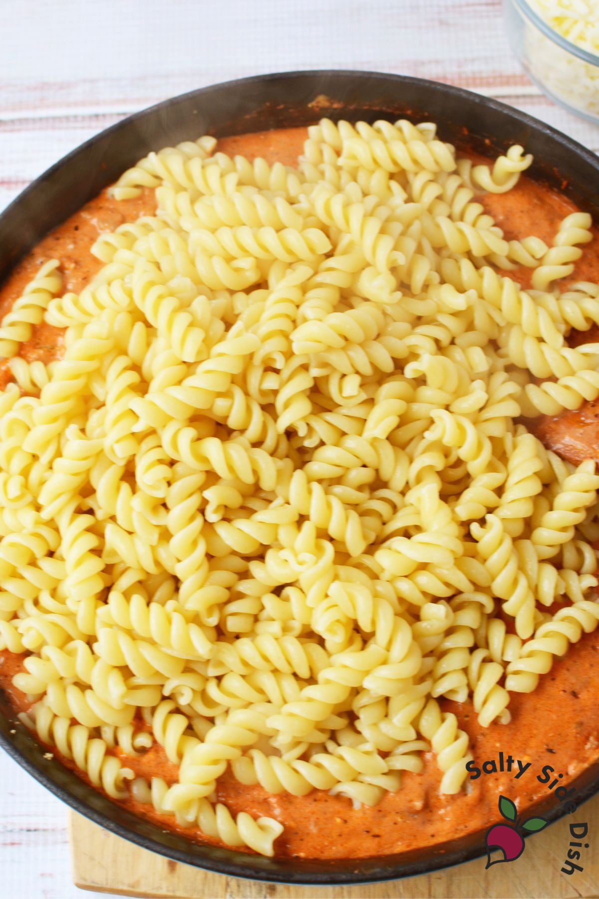 100 million views viral easy cheesy pasta with ground beef in a skillet