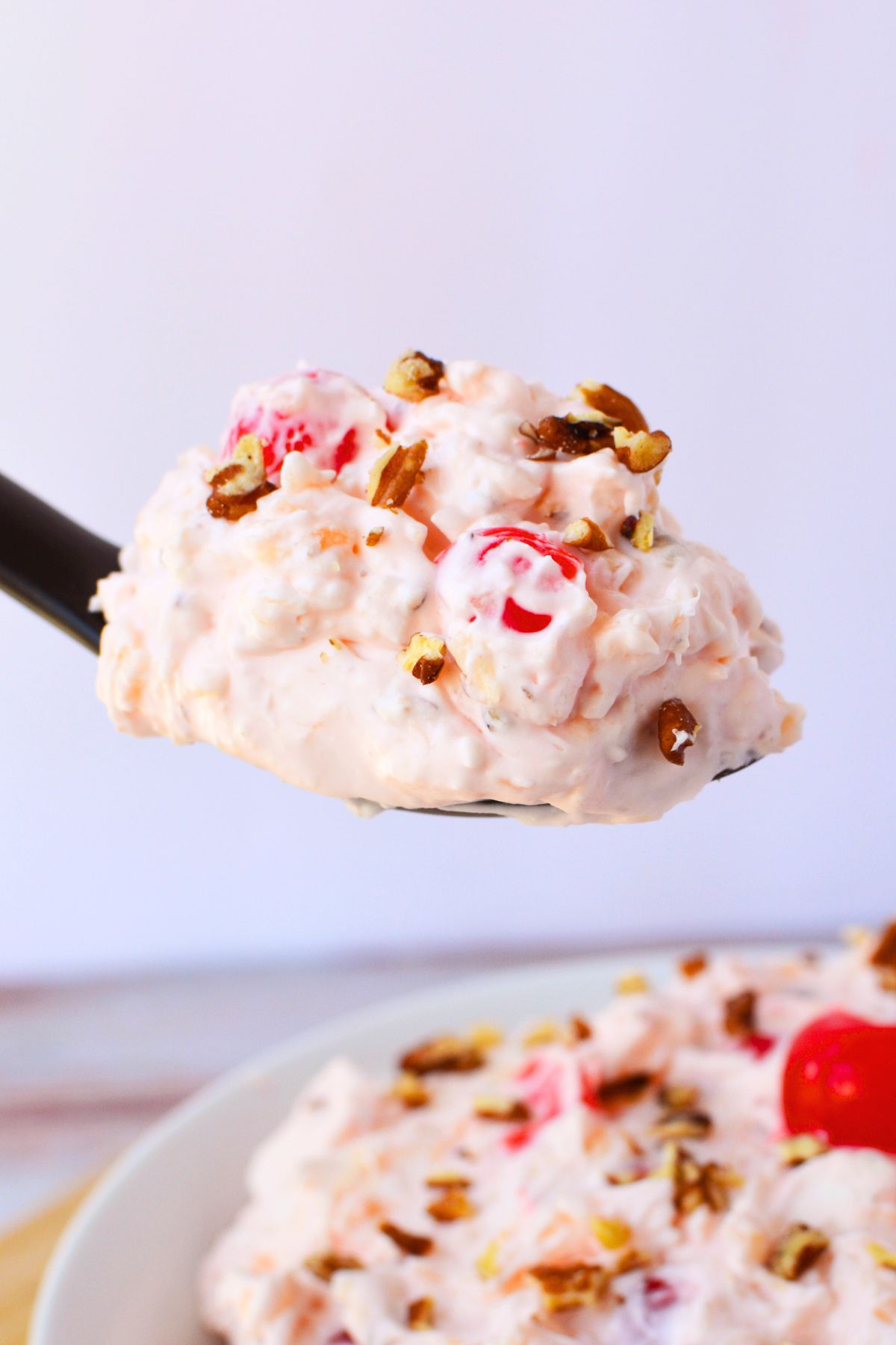 serving cherry salad with marshmallows and cream cheese.