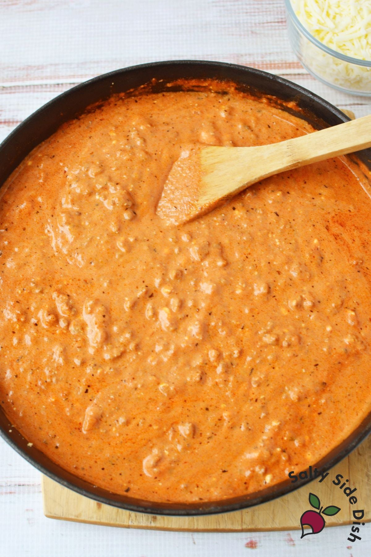 viral instagram pasta recipe cheesy ground beef rotini with broiled mozzarella in skillet