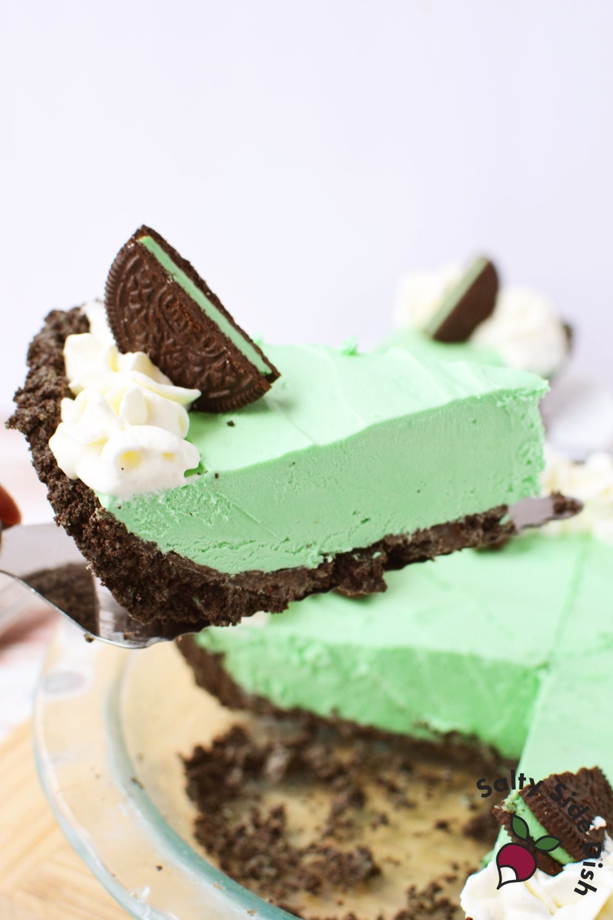 frozen grasshopper pie slice showing creamy mint texture