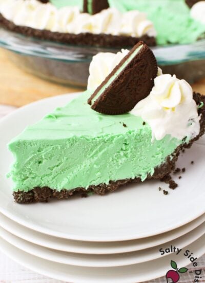 grasshopper pie slice topped with whipped cream and mint oreo