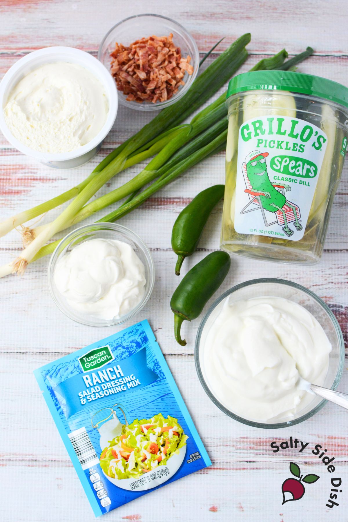 Ingredients for Grillo’s pickle dip with cream cheese, sour cream, ranch seasoning, bacon, jalapeno, and dill pickles
