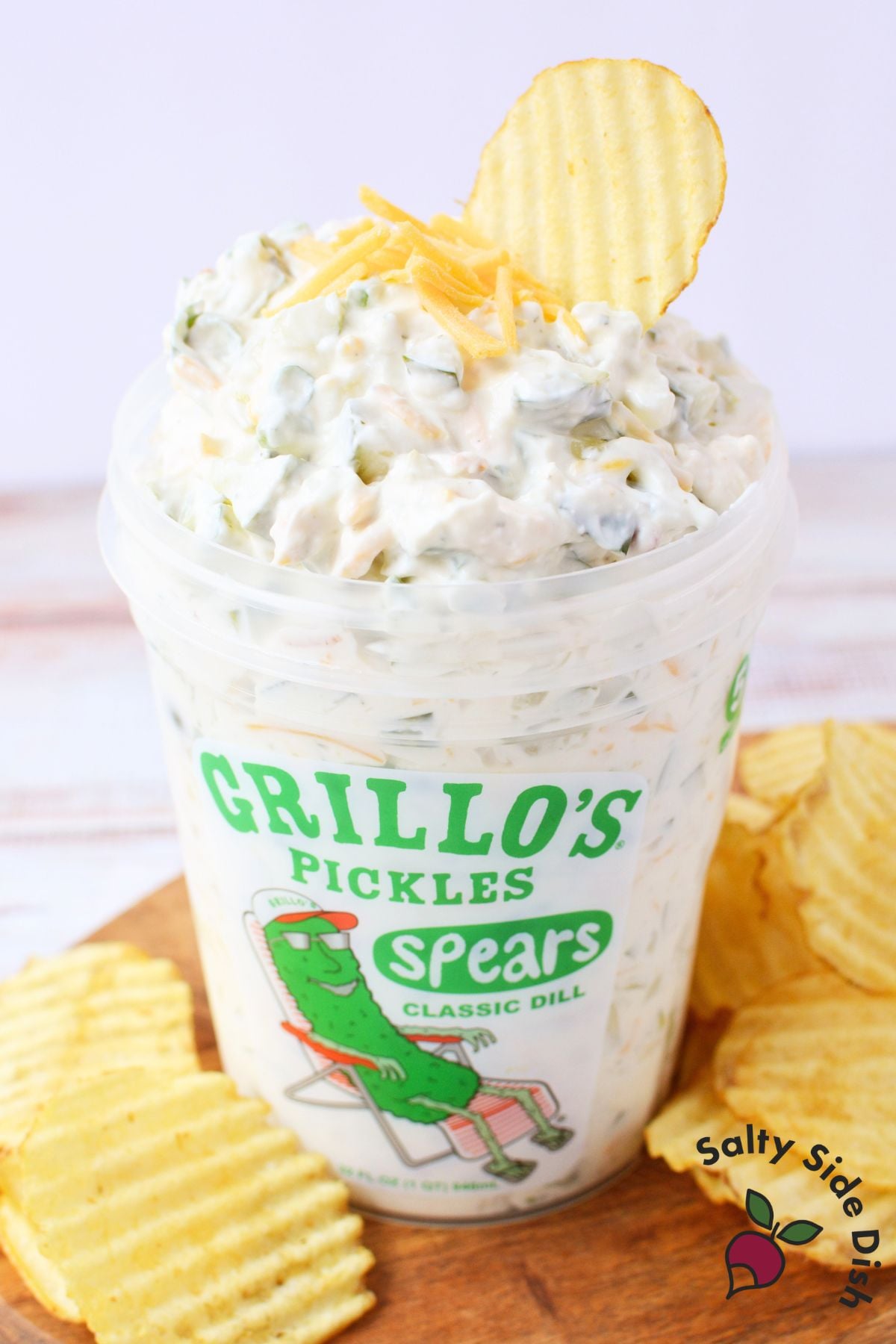 Finished Grillo’s pickle dip served in a Grillo’s pickle container with chips