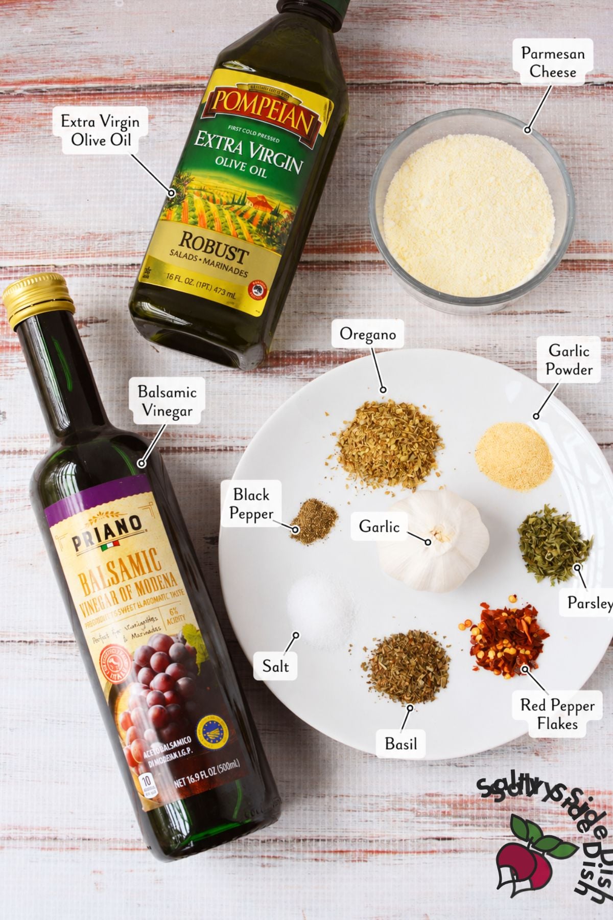 Ingredients for viral bread dip recipe including olive oil, balsamic vinegar, parmesan cheese, garlic, and Italian herbs