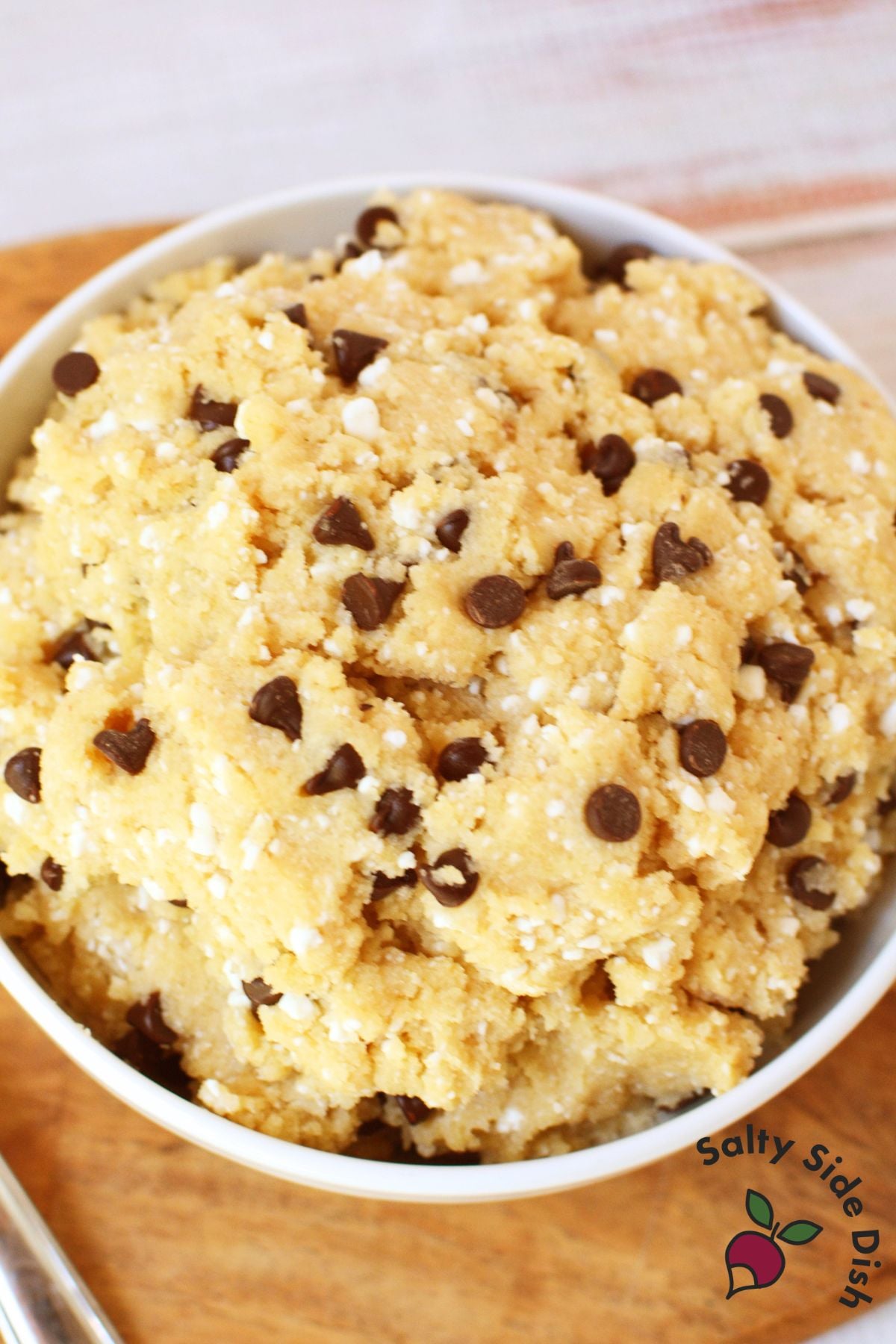 viral TikTok cottage cheese cookie dough in a white bowl with mini chocolate chips