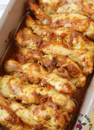 Oven baked chicken thighs cooked in a loaf pan with pan juices