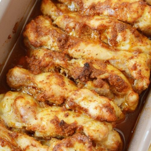 Oven baked chicken thighs cooked in a loaf pan with pan juices