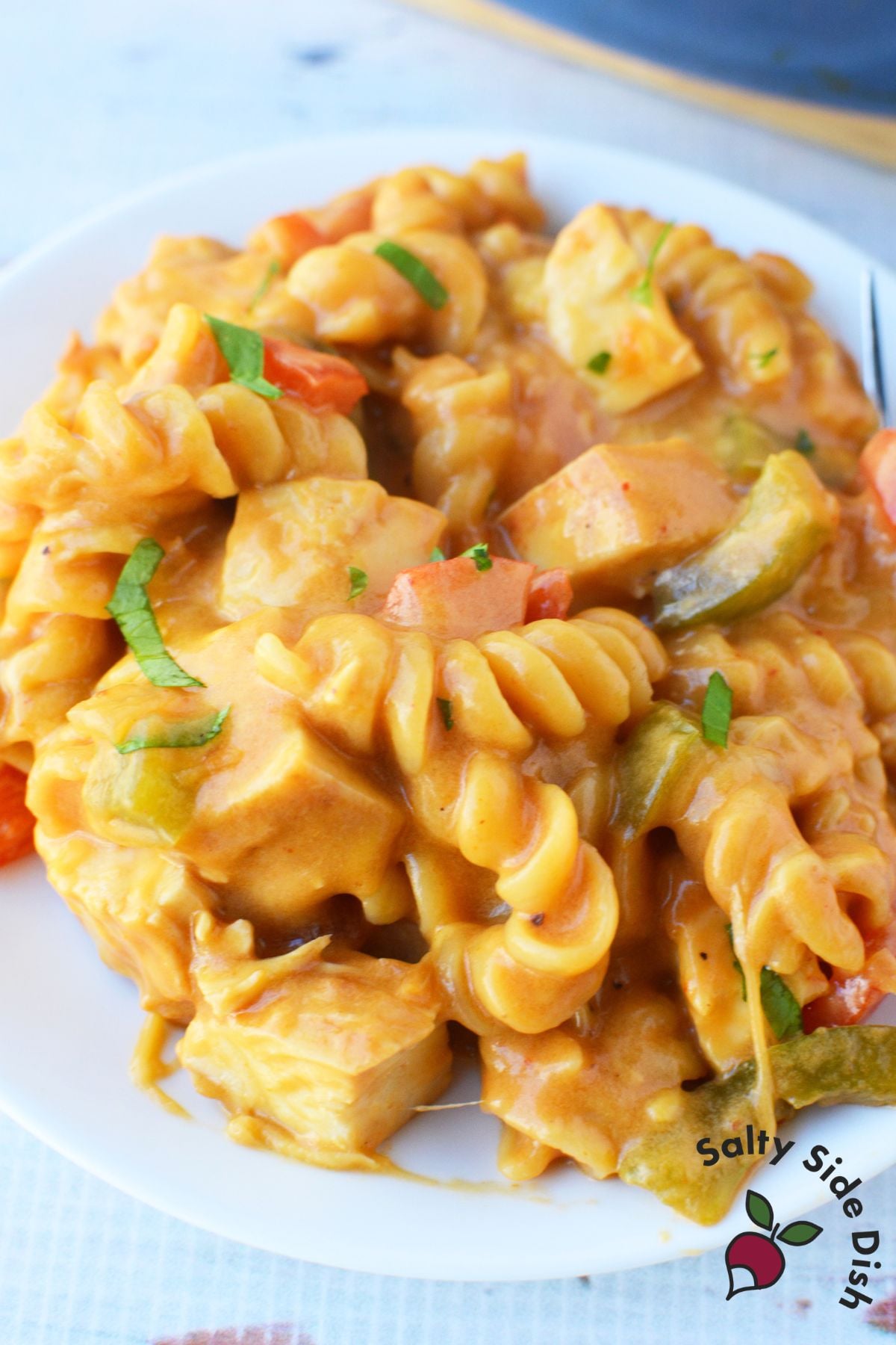 Close up of fajita chicken macaroni and cheese with tender pasta and a creamy sauce
