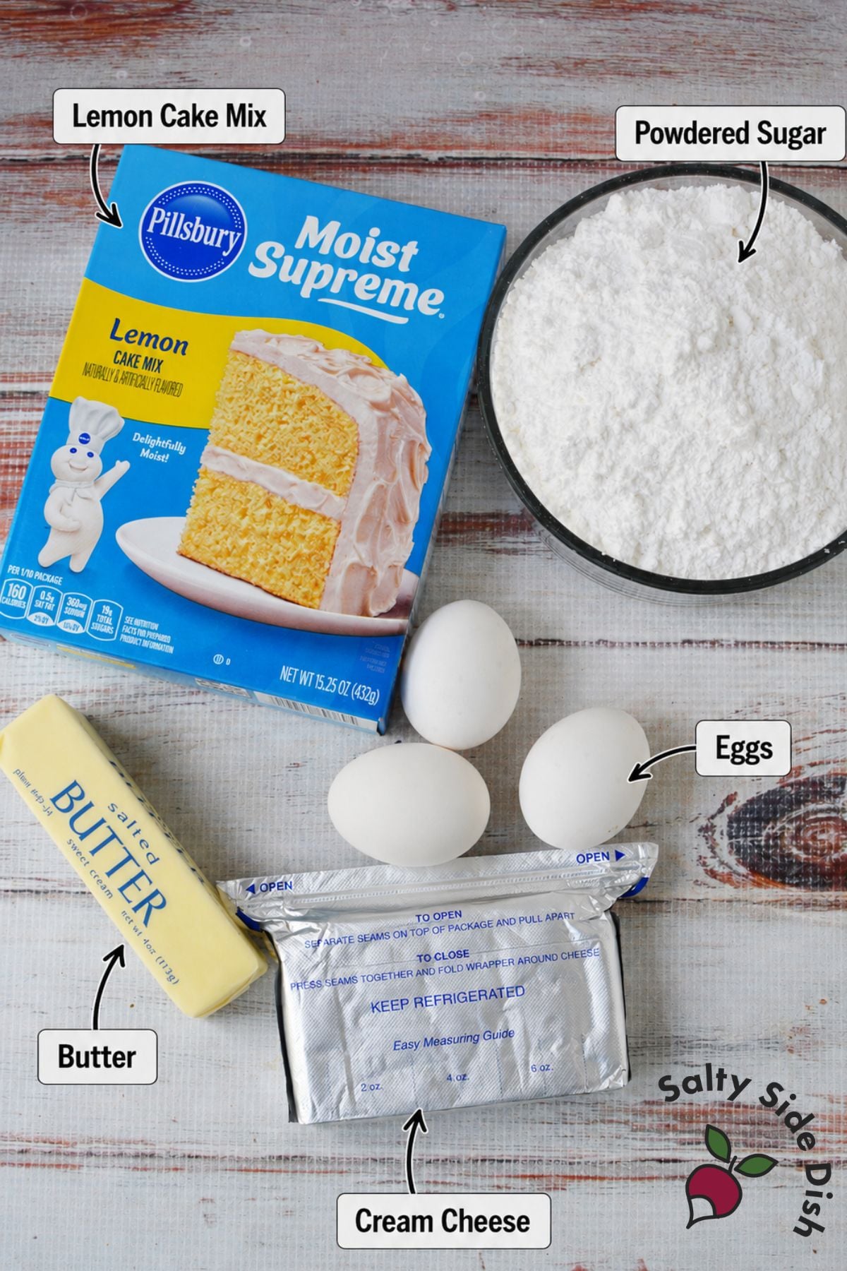 Ingredients for lemon cookie bars including lemon cake mix, cream cheese, butter, eggs, and powdered sugar