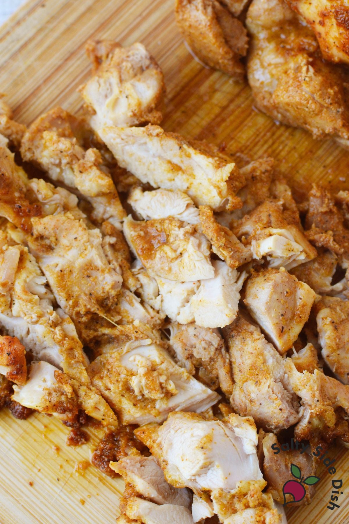 Diced oven baked chicken thighs ready for salads, wraps, and lunches