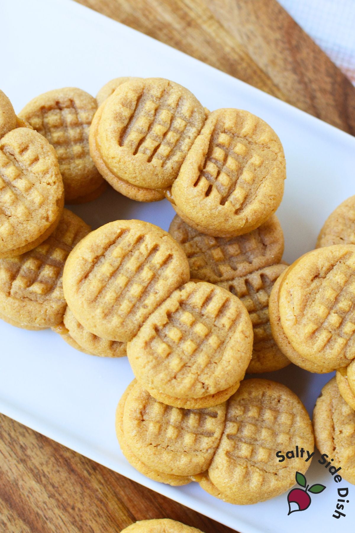 A platter piled with homemade Nutter Butter sandwich cookies