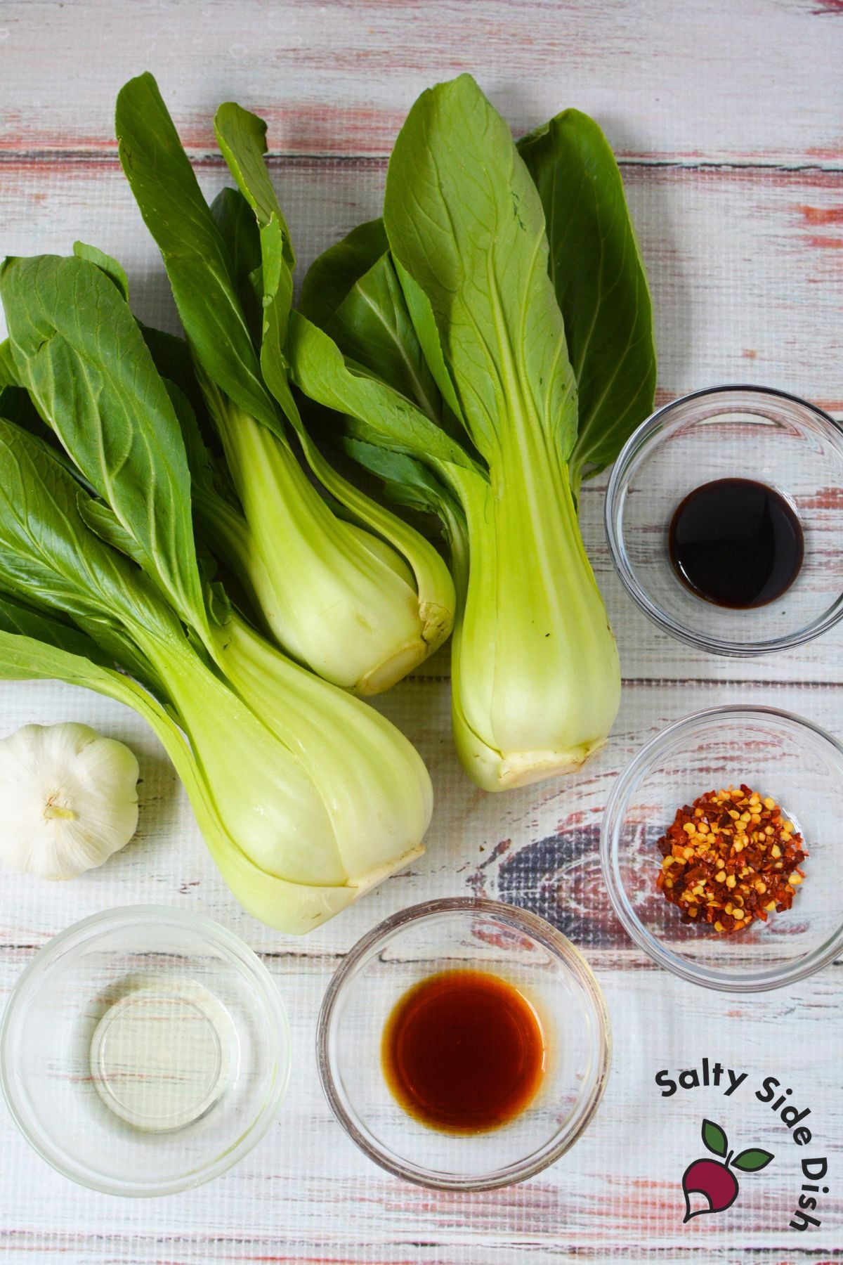 Fresh baby bok choy with garlic, soy sauce, oyster sauce, oil, and crushed red pepper