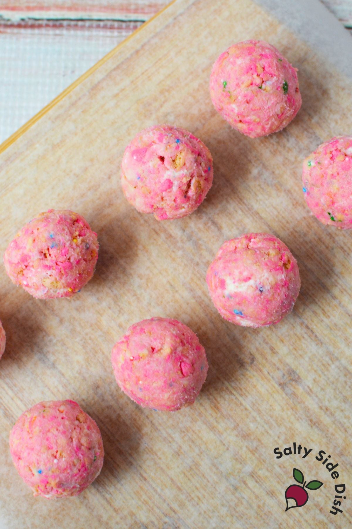 Rolled Circus Animal Cookie truffle balls before chilling and dipping