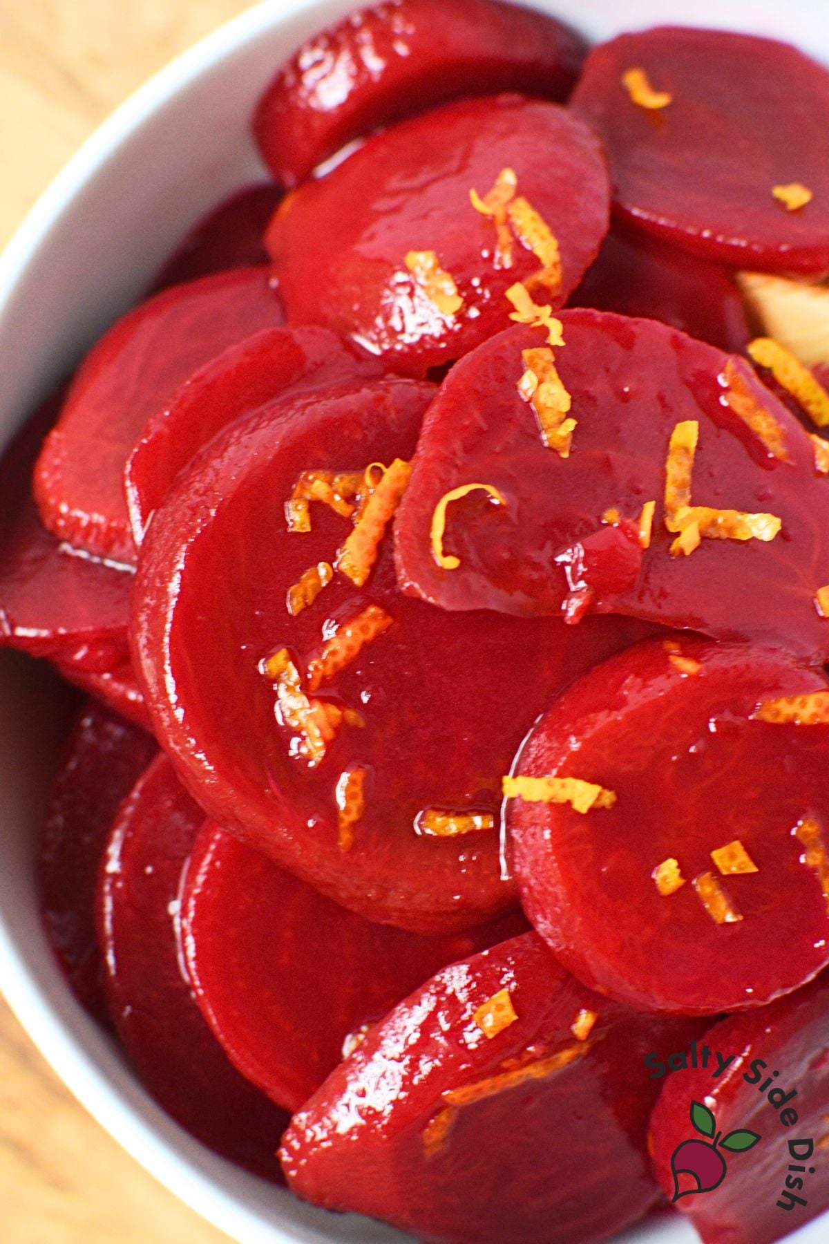 Close-up of Harvard beets made with canned sliced beets and orange zest