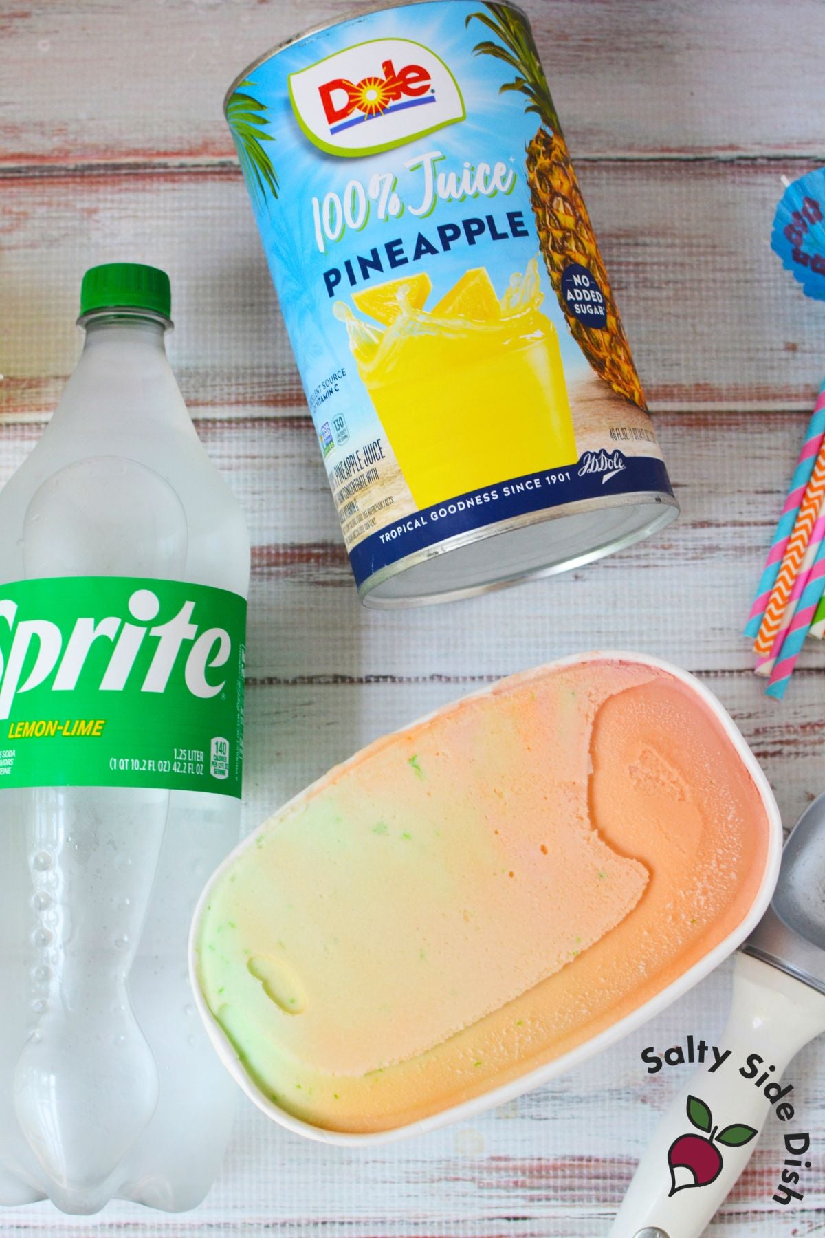Ingredients for rainbow sherbet punch with Sprite, pineapple juice, and rainbow sherbet